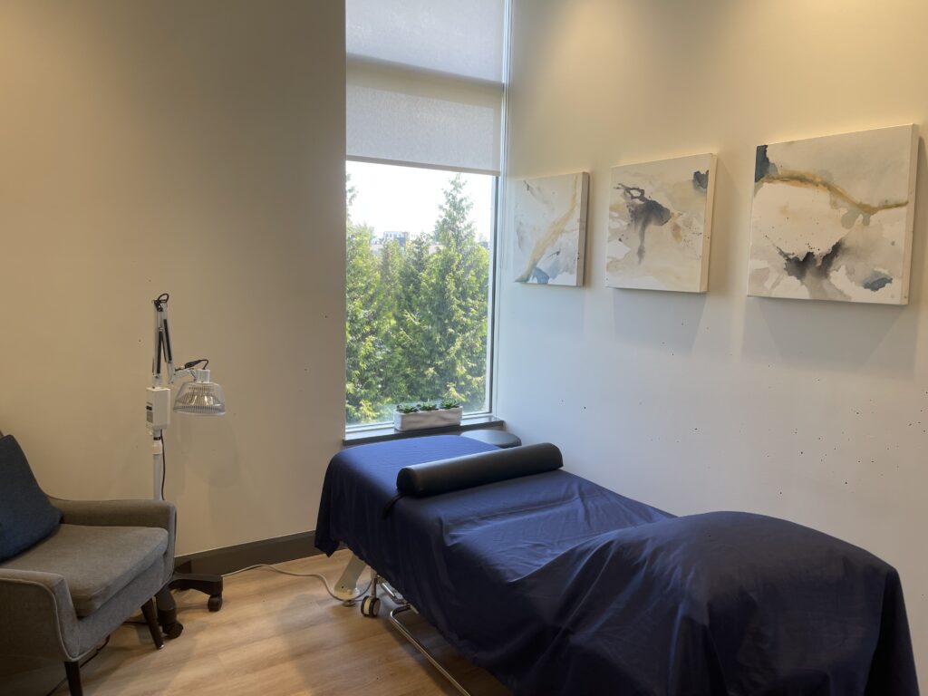 Acupuncture treatment room at Balance Acupuncture Langley with natural light, comfortable treatment tables, and a peaceful healing environment.